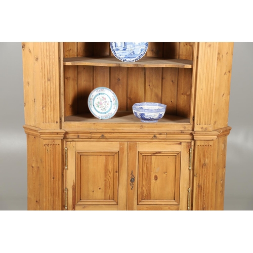 1572 - A PINE BARREL BACK ALCOVE CUPBOARD. the upper section with Classical architectural features to three... 