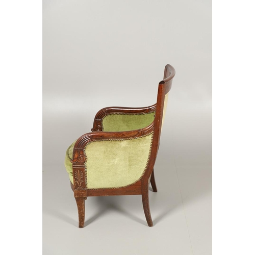 1575 - A FRENCH EMPIRE MAHOGANY ARMCHAIR, CIRCA 1830. the carved frame with anthemion decoration on swept l... 