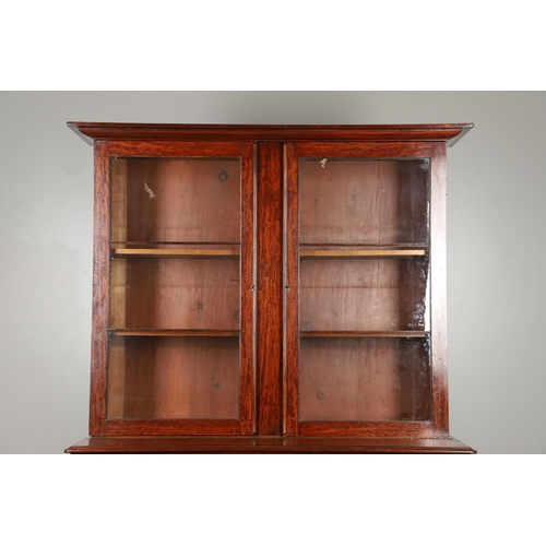 1583 - A LATE 19TH CENTURY MAHOGANY LIBRARY BOOKCASE. the glazed upper half enclosing four adjustable shelv... 