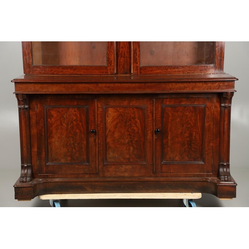 1583 - A LATE 19TH CENTURY MAHOGANY LIBRARY BOOKCASE. the glazed upper half enclosing four adjustable shelv... 