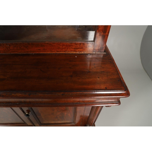 1583 - A LATE 19TH CENTURY MAHOGANY LIBRARY BOOKCASE. the glazed upper half enclosing four adjustable shelv... 