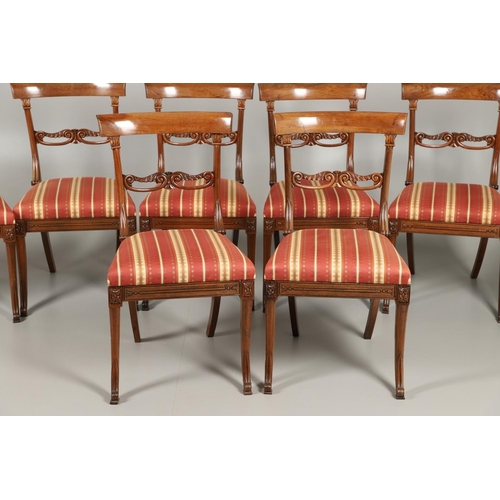 1585 - A SET OF EIGHT REGENCY MAHOGANY DINING CHAIRS. the curving crest rails to a carved frame with scroll... 