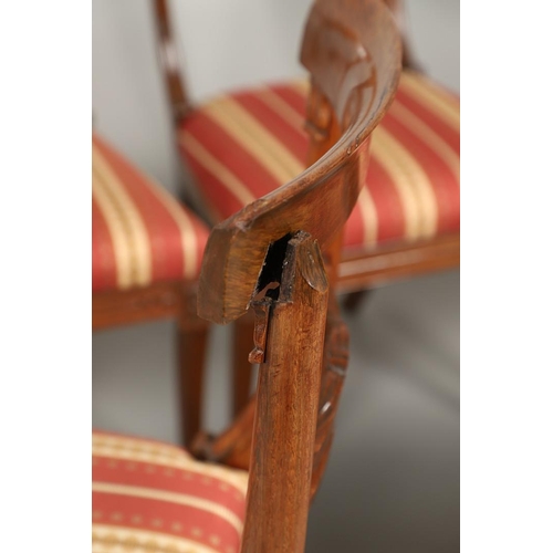 1585 - A SET OF EIGHT REGENCY MAHOGANY DINING CHAIRS. the curving crest rails to a carved frame with scroll... 