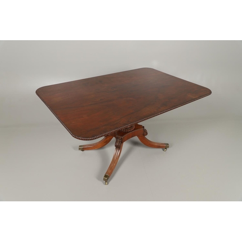 1586 - A REGENCY MAHOGANY TILT TOP BREAKFAST TABLE. the rectangular top with beaded moulded edge upon a car... 