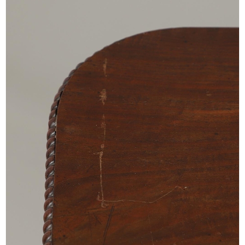 1586 - A REGENCY MAHOGANY TILT TOP BREAKFAST TABLE. the rectangular top with beaded moulded edge upon a car... 