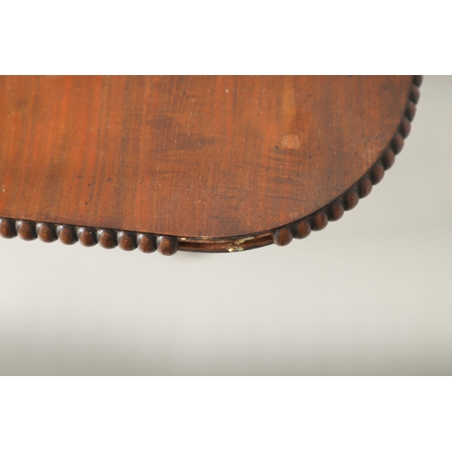 1586 - A REGENCY MAHOGANY TILT TOP BREAKFAST TABLE. the rectangular top with beaded moulded edge upon a car... 