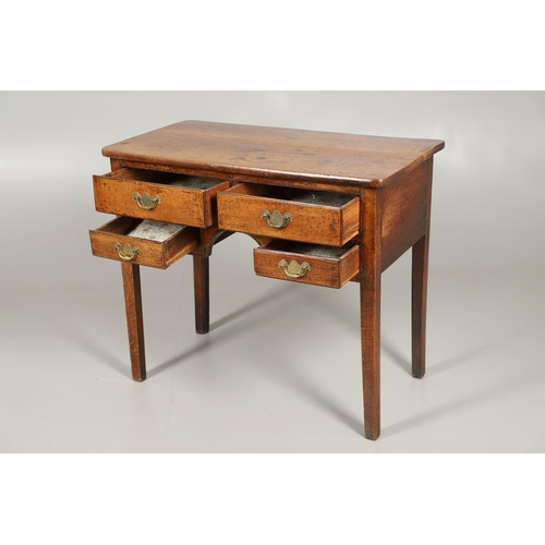 1587 - AN 18TH CENTURY OAK LOWBOY. the four drawers over an arched apron and square chamfered legs, height ... 