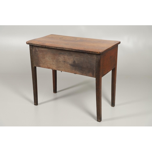 1587 - AN 18TH CENTURY OAK LOWBOY. the four drawers over an arched apron and square chamfered legs, height ... 