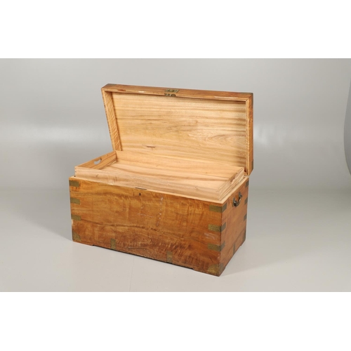 1596 - A LATE 19TH CENTURY CAMPHORWOOD BRASS BOUND CHEST. in the military style with side carrying handles,... 