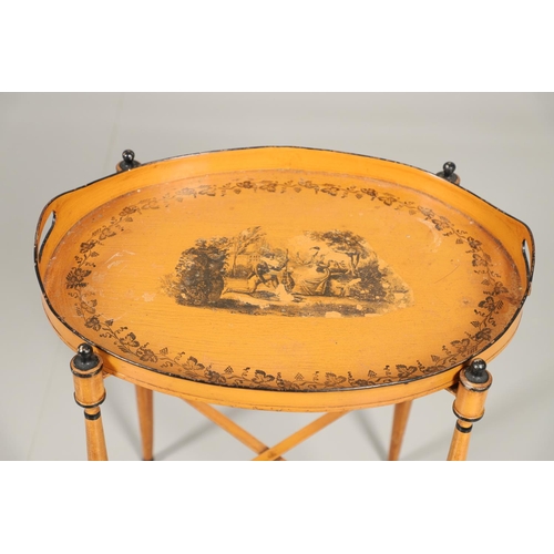 1599 - A REGENCY STYLE TOLEWARE OVAL TRAY AND FOLDING STAND. the painted tray decorated with central printe... 