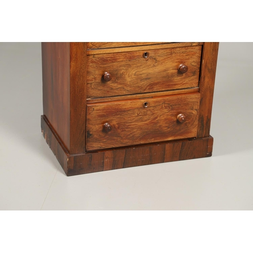 1601 - A VICTORIAN ROSEWOOD WELLINGTON STYLE CHEST. the six drawers with carved scroll and flower corbels o... 