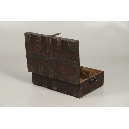 1602 - MILITARY INTEREST: AN OAK AND IRON BOUND CANTEEN CHEST. with iron strapwork and iron handles to each... 