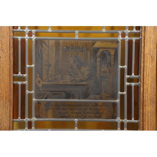 1606 - A PAIR OF DUTCH STAINED GLASS WINDOWS. depicting jewellers or silversmiths at work, bordered by lead... 