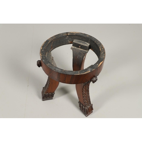 1607 - AN EMPIRE ROSEWOOD LOW TABLE. with a circular dark grey marble top upon a triform base, heavily carv... 