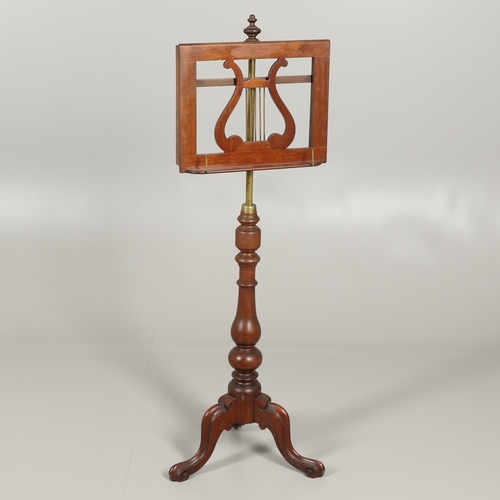 1608 - A 19TH CENTURY MAHOGANY MUSIC STAND. the lectern top with turned finial and lyre-form music sheet su... 