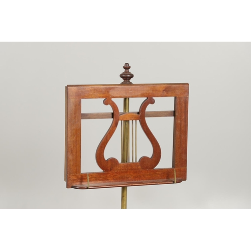 1608 - A 19TH CENTURY MAHOGANY MUSIC STAND. the lectern top with turned finial and lyre-form music sheet su... 