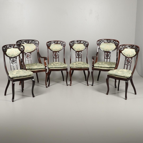 1609 - A SET OF SIX ART NOUVEAU MAHOGANY DINING CHAIRS. circa 1900, the backs pierced and carved with fruit... 