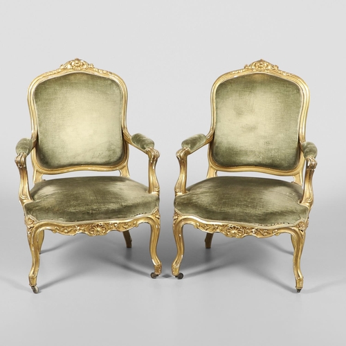 1610 - A PAIR OF 19TH CENTURY LOUIS XV STYLE GILTWOOD FAUTEUILS A LA REINES. each with a carved show frame ... 