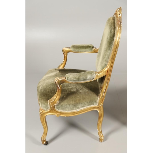 1610 - A PAIR OF 19TH CENTURY LOUIS XV STYLE GILTWOOD FAUTEUILS A LA REINES. each with a carved show frame ... 