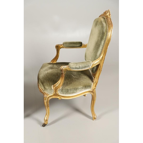 1610 - A PAIR OF 19TH CENTURY LOUIS XV STYLE GILTWOOD FAUTEUILS A LA REINES. each with a carved show frame ... 