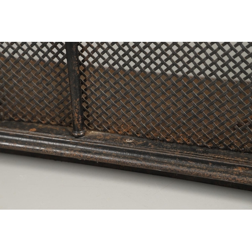 1611 - A 19TH CENTURY PAINTED WROUGHT IRON FENDER. the front and sides with pierced lattice work and attach... 