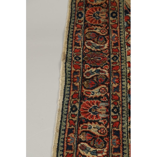 1731 - A WEST PERSIAN SINGLE WEFTED RUG, CIRCA 1940. the ivory field of vines around a central floral panel... 