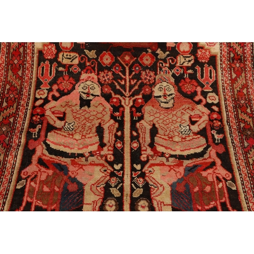 1733 - A KARABAGH RUG, SOUTH CAUCASUS, CIRCA 1920. the field depicting two mythological figures surrounded ... 