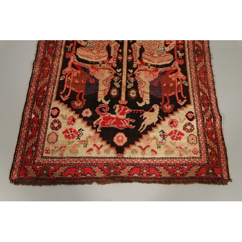 1733 - A KARABAGH RUG, SOUTH CAUCASUS, CIRCA 1920. the field depicting two mythological figures surrounded ... 