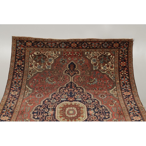 1735 - A SAROUK RUG, WEST PERSIA, CIRCA 1930. the brick red field of angular vines around an ivory and indi... 