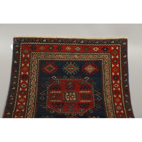 1737 - A CHAJLI RUG, EAST CAUCASUS, CIRCA 1900. the deep indigo field with three large octagons containing ... 