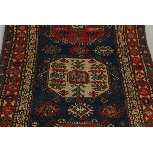 1737 - A CHAJLI RUG, EAST CAUCASUS, CIRCA 1900. the deep indigo field with three large octagons containing ... 