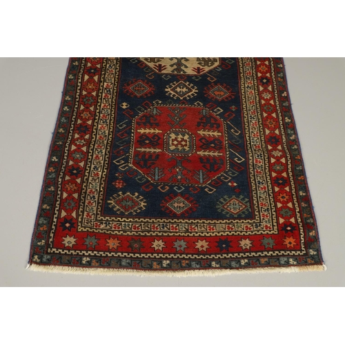 1737 - A CHAJLI RUG, EAST CAUCASUS, CIRCA 1900. the deep indigo field with three large octagons containing ... 