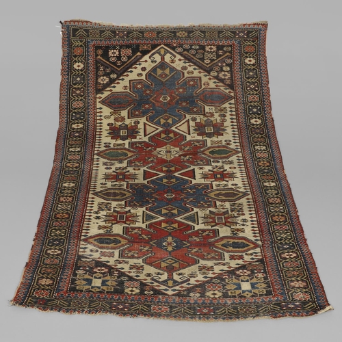 1742 - A SHIRVAN RUG, SOUTH EAST CAUCASUS, CIRCA 1910. the ivory lozenge field with four medallions enclose... 