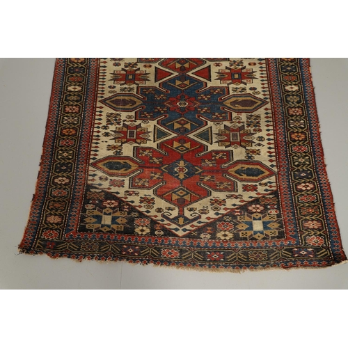 1742 - A SHIRVAN RUG, SOUTH EAST CAUCASUS, CIRCA 1910. the ivory lozenge field with four medallions enclose... 