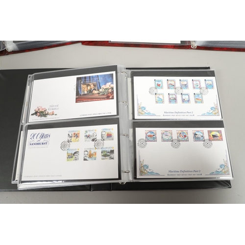 664 - GUERNSEY STAMP ALBUMS & FIRST DAY COVERS. Including two Stanley Gibbons albums with mint  stamps, on... 