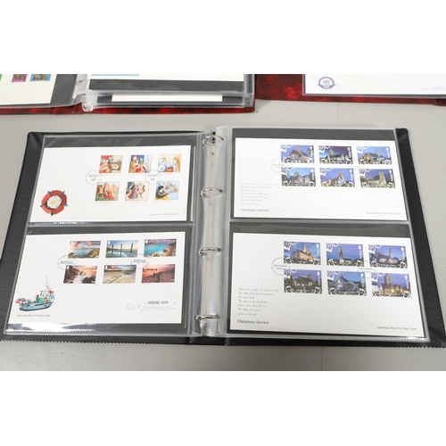 664 - GUERNSEY STAMP ALBUMS & FIRST DAY COVERS. Including two Stanley Gibbons albums with mint  stamps, on... 