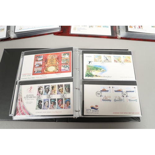 664 - GUERNSEY STAMP ALBUMS & FIRST DAY COVERS. Including two Stanley Gibbons albums with mint  stamps, on... 