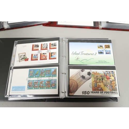 664 - GUERNSEY STAMP ALBUMS & FIRST DAY COVERS. Including two Stanley Gibbons albums with mint  stamps, on... 