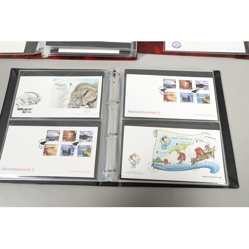 664 - GUERNSEY STAMP ALBUMS & FIRST DAY COVERS. Including two Stanley Gibbons albums with mint  stamps, on... 