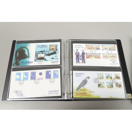 665 - ALDERNEY STAMP ALBUM, FIRST DAY COVERS, & DEFINITIVE FIRST DAY COVERS. Including a Stanley Gibbons a... 