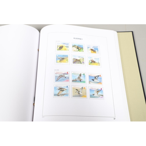 665 - ALDERNEY STAMP ALBUM, FIRST DAY COVERS, & DEFINITIVE FIRST DAY COVERS. Including a Stanley Gibbons a... 