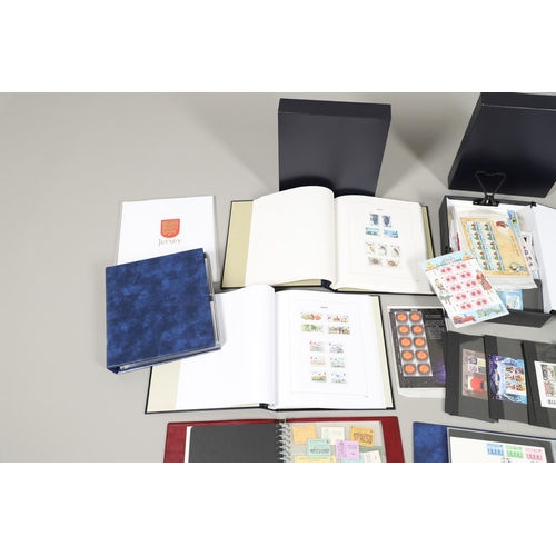 666 - JERSEY STAMP COLLECTION & FIRST DAY COVERS. Including three Stanley Gibbons albums in slip cases (Vo... 