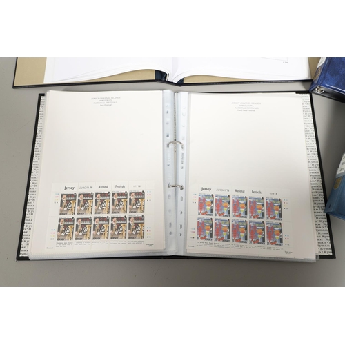 666 - JERSEY STAMP COLLECTION & FIRST DAY COVERS. Including three Stanley Gibbons albums in slip cases (Vo... 