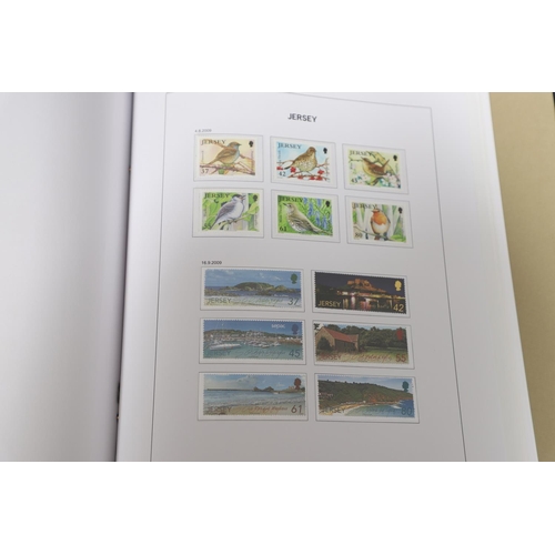 666 - JERSEY STAMP COLLECTION & FIRST DAY COVERS. Including three Stanley Gibbons albums in slip cases (Vo... 