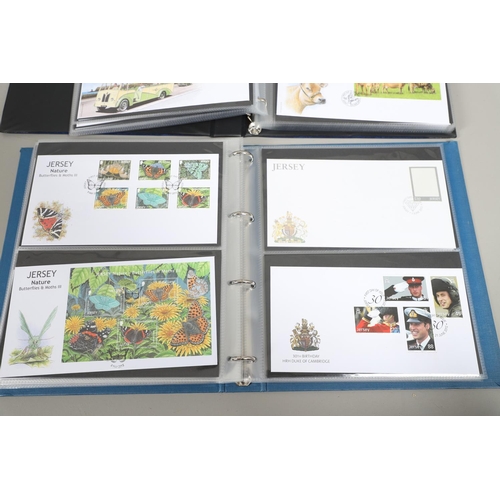 666 - JERSEY STAMP COLLECTION & FIRST DAY COVERS. Including three Stanley Gibbons albums in slip cases (Vo... 