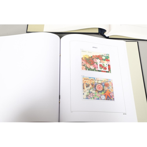 666 - JERSEY STAMP COLLECTION & FIRST DAY COVERS. Including three Stanley Gibbons albums in slip cases (Vo... 