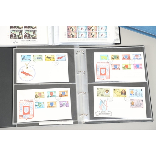 666 - JERSEY STAMP COLLECTION & FIRST DAY COVERS. Including three Stanley Gibbons albums in slip cases (Vo... 