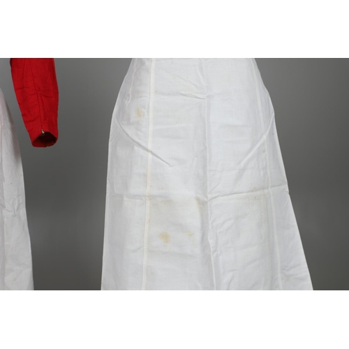 677 - VINTAGE NURSES UNIFORMS & RED CROSS APRONS. A qty of Nurses Uniforms to include a blue Chambray cott... 