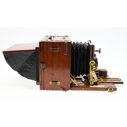 726 - EARLY PLATE CAMERA - 'THE SANDERSON'. A mahogany 'The Sanderson' plate camera with a Koilos lens, in... 