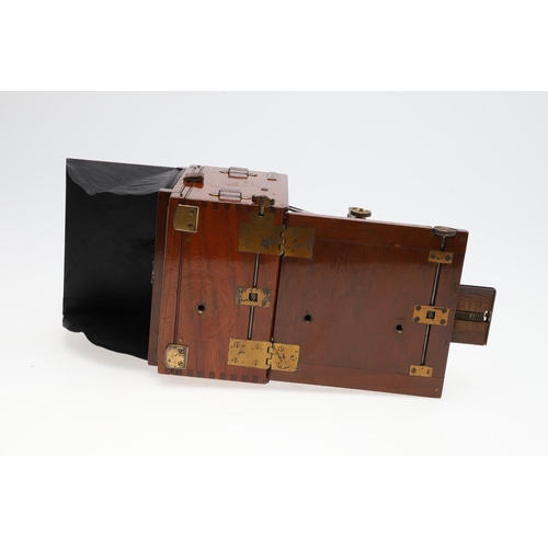 726 - EARLY PLATE CAMERA - 'THE SANDERSON'. A mahogany 'The Sanderson' plate camera with a Koilos lens, in... 